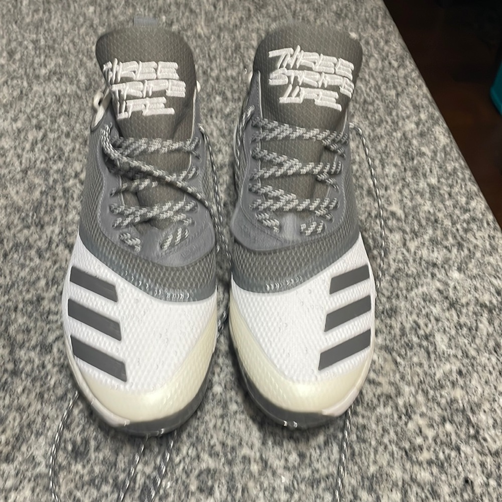 New, never worn Adidas baseball cleats.